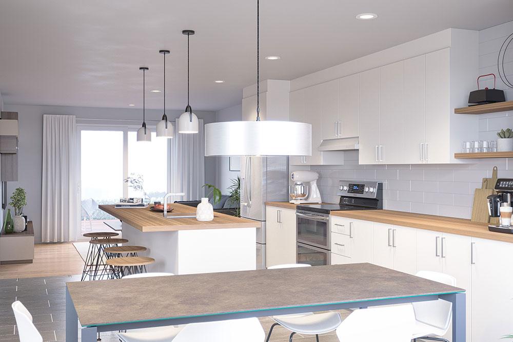 Cuisine d'un condo locatif avec vue sur le salon du projet Littera à Drummondville